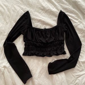 black cropped long sleeve top